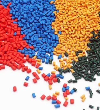 Masterbatch pellets in various colors, used for coloring and enhancing properties in plastic manufacturing processes