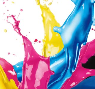 vibrant pigment powders and mixing equipment, illustrating the diversity and complexity of the colour industry